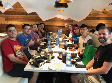 Lab members eating out at a Korean hot pot restaurant.