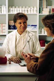 Pharmacist assisting a client