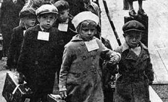 Finnish children with suitcases being evacuated from the country during World War II