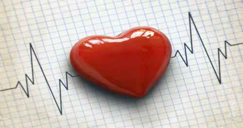 3-D heart shape on top of cardiograph printout