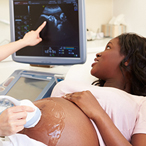 pregnant woman getting a sonogram