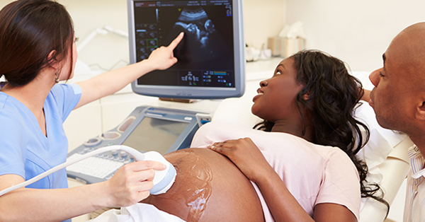 pregnant woman getting a sonogram