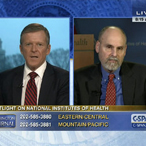 C-SPAN host Steve Scully with Alan E. Guttmacher