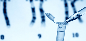Stock image of pipette, tube, and karyotype.