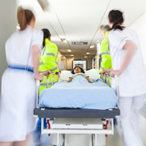 Little girl in a gurney in an emergency room