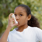 Young girl with inhaler