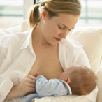 woman breastfeeding baby