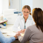 Man and woman with their health care provider