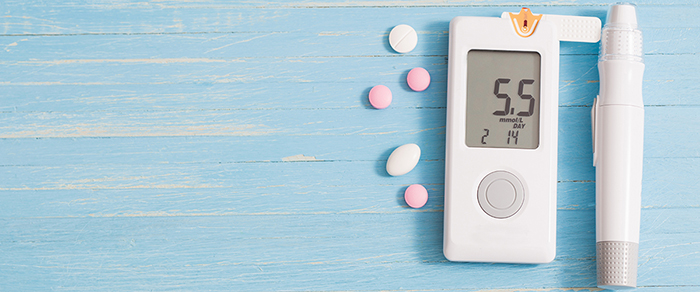 Pills and diabetes testing equipment.