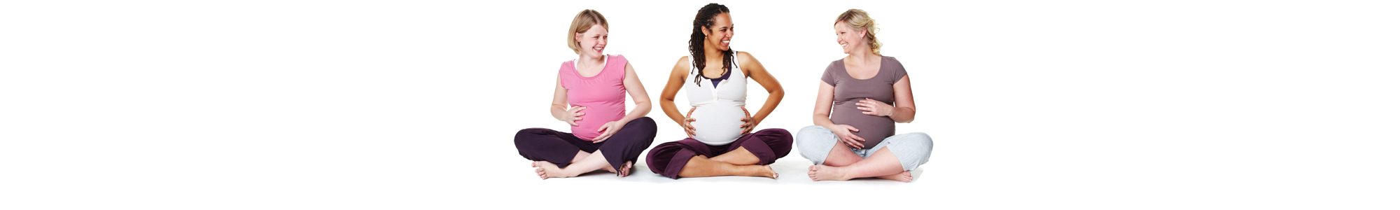 Pregnant women sitting together in a row.