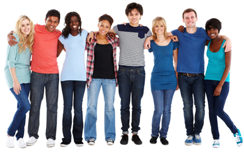 Multi-ethnic group of teenagers stand in a row with arms around one another.