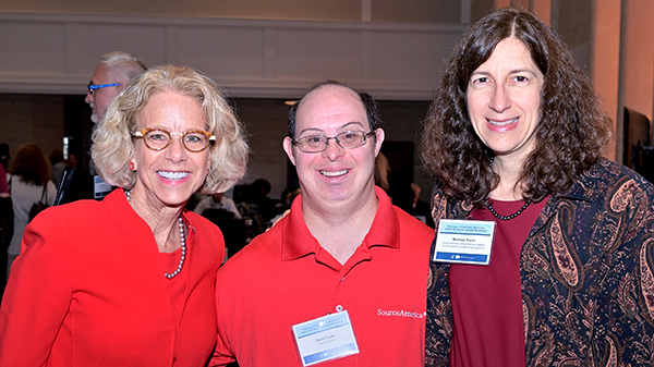 NICHD Director Dr. Diana Bianchi stands with Down syndrome research participant David Egan and Dr. Melissa Parisi, chief of the Intellectual and Developmental Disabilities Branch.