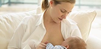 Mother breastfeeding baby.