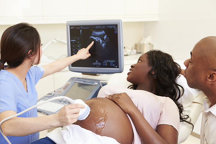 Pregnant woman having an ultrasound.