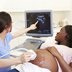 Pregnant woman having an ultrasound.