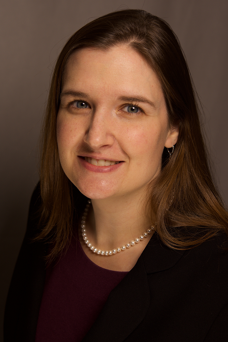 A headshot of Theresa Cruz, Ph.D.