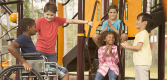 Children of all abilities on the playground.