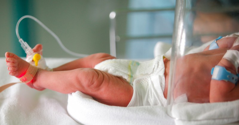 An infant in a neonatal intensive care unit.