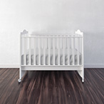 Empty infant crib.