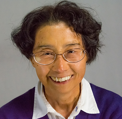 Photograph of Dr. Ozato smiling in 2015.