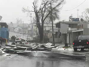 Streets in Puerto Rico blocked by debris after Hurricane Maria. 