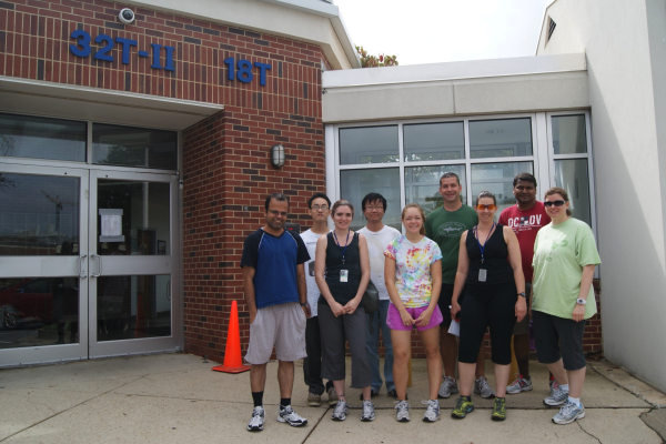 Nine lab members pose outside the 32T-II 18T building after the 2011 NIH relay race.