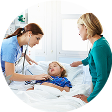 Female doctor listening to young girl's heart with stethoscope while mother looks on.