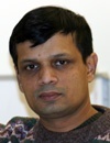 headshot of Moinuddin Hassan