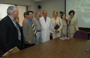Clinicians standing with dignitaries from greece.