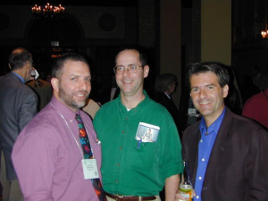 Larry, Kurt, and Dr. Stratakis smiling.