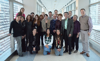 Group photo of Stratakis lab in hallway.