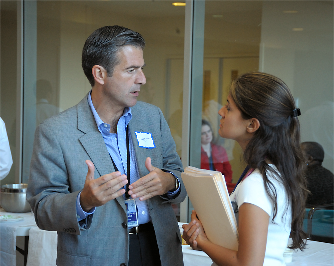 Dr. Stratakis having discussion with a fellow.