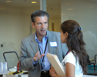 Dr. Stratakis and fellow having a discussion.