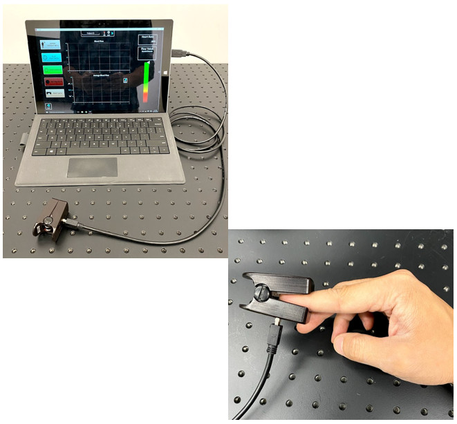 flowMET device with finger clip.