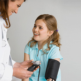 Young child with health care provider