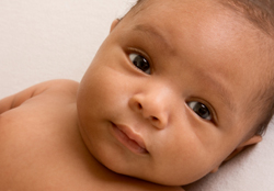 ethnic baby boy lying down