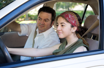 teenager taking a driving test