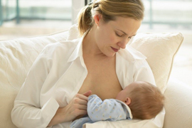 Mother breastfeeding child