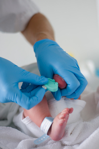 newborn receiving treatment in hospital