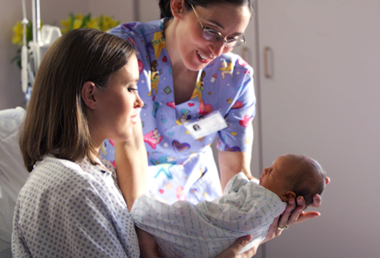 Stock image of mother, infant, and nurse.