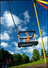 image of a person on a swing.